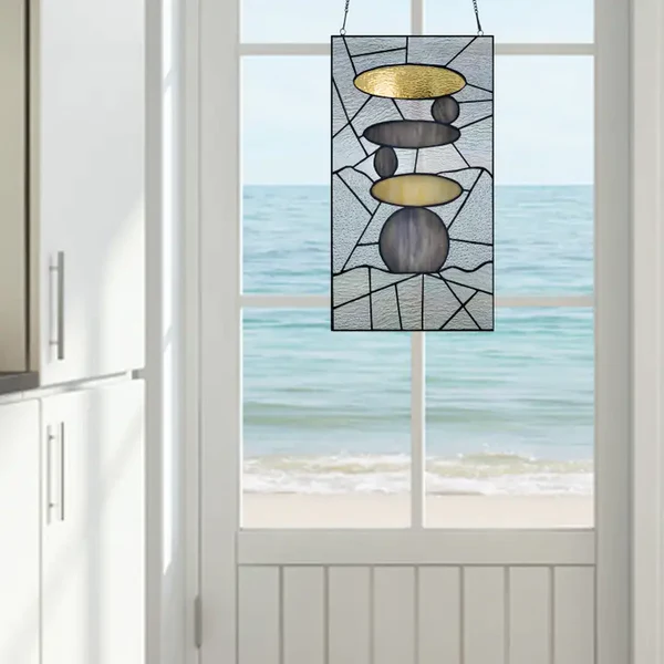 Gray and Gold Zen Stones Stained Glass Window Pane in ocean front cottage window