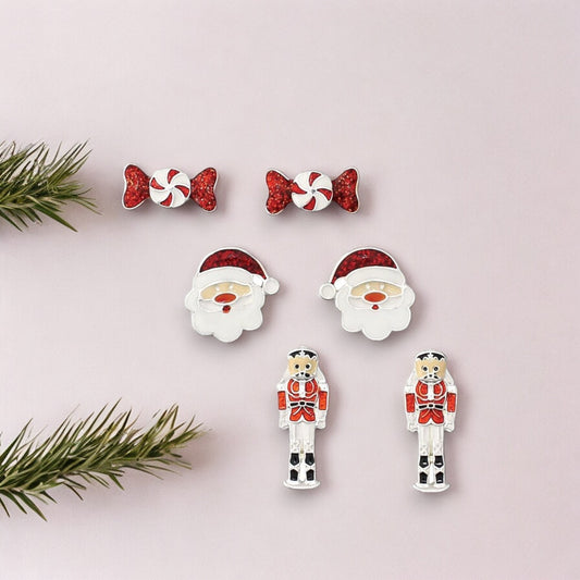 Holiday Trio Earrings: Peppermint Candy Bow, Santa Head, and Nut Cracker - Mellow Monkey