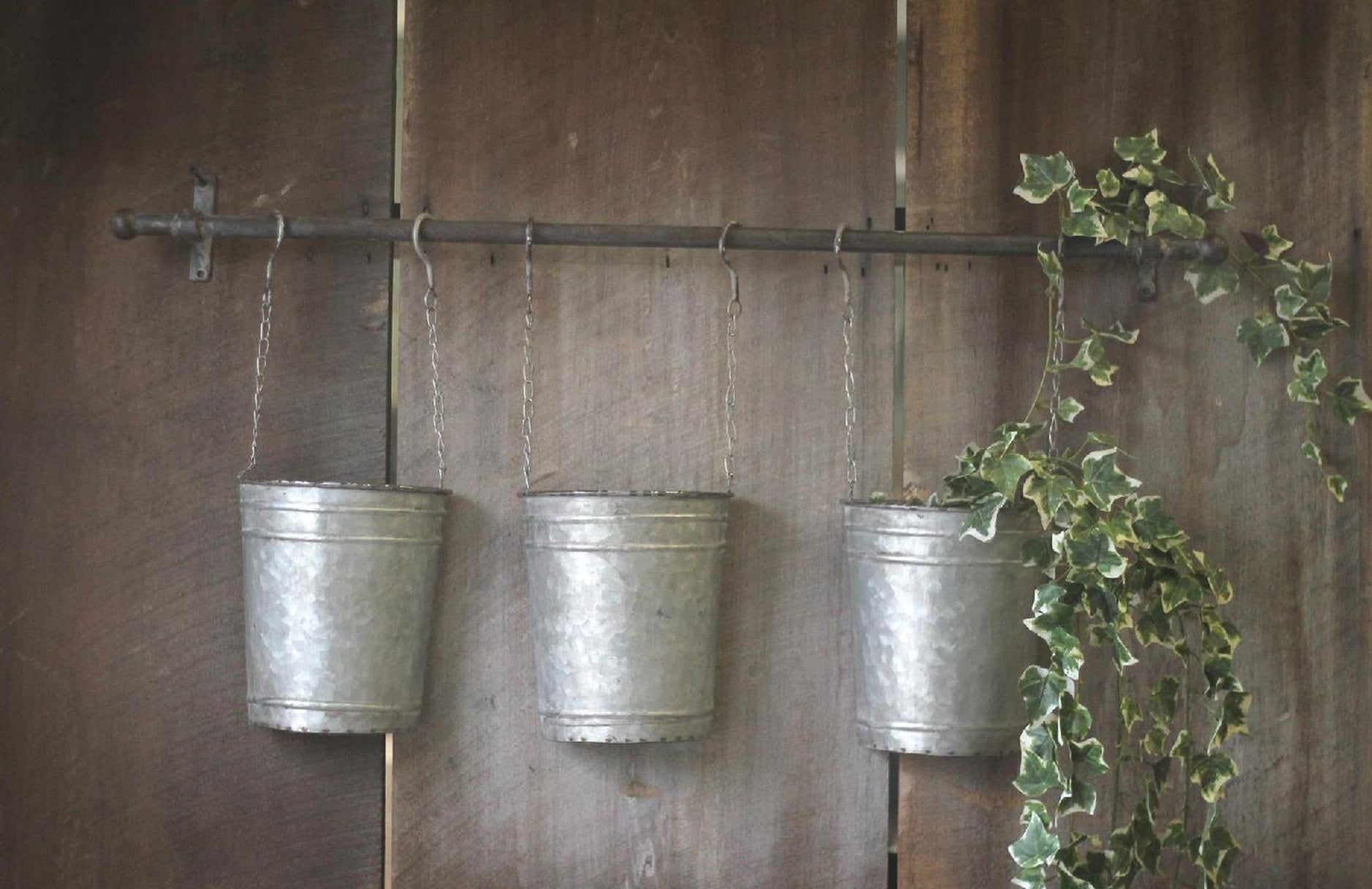 metal hanging bucket wall planter Vintage Wall Rod with Hanging Buckets Peacock Park Designs KG4886