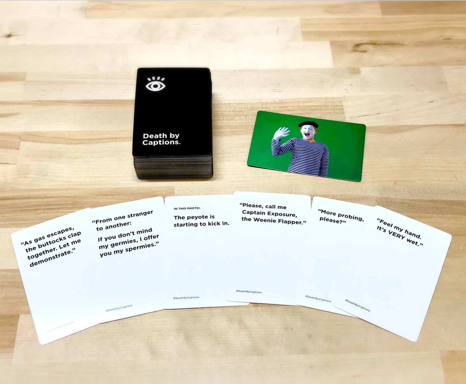 Death by Captions - The Very Innappropriate Party Game - Mellow Monkey