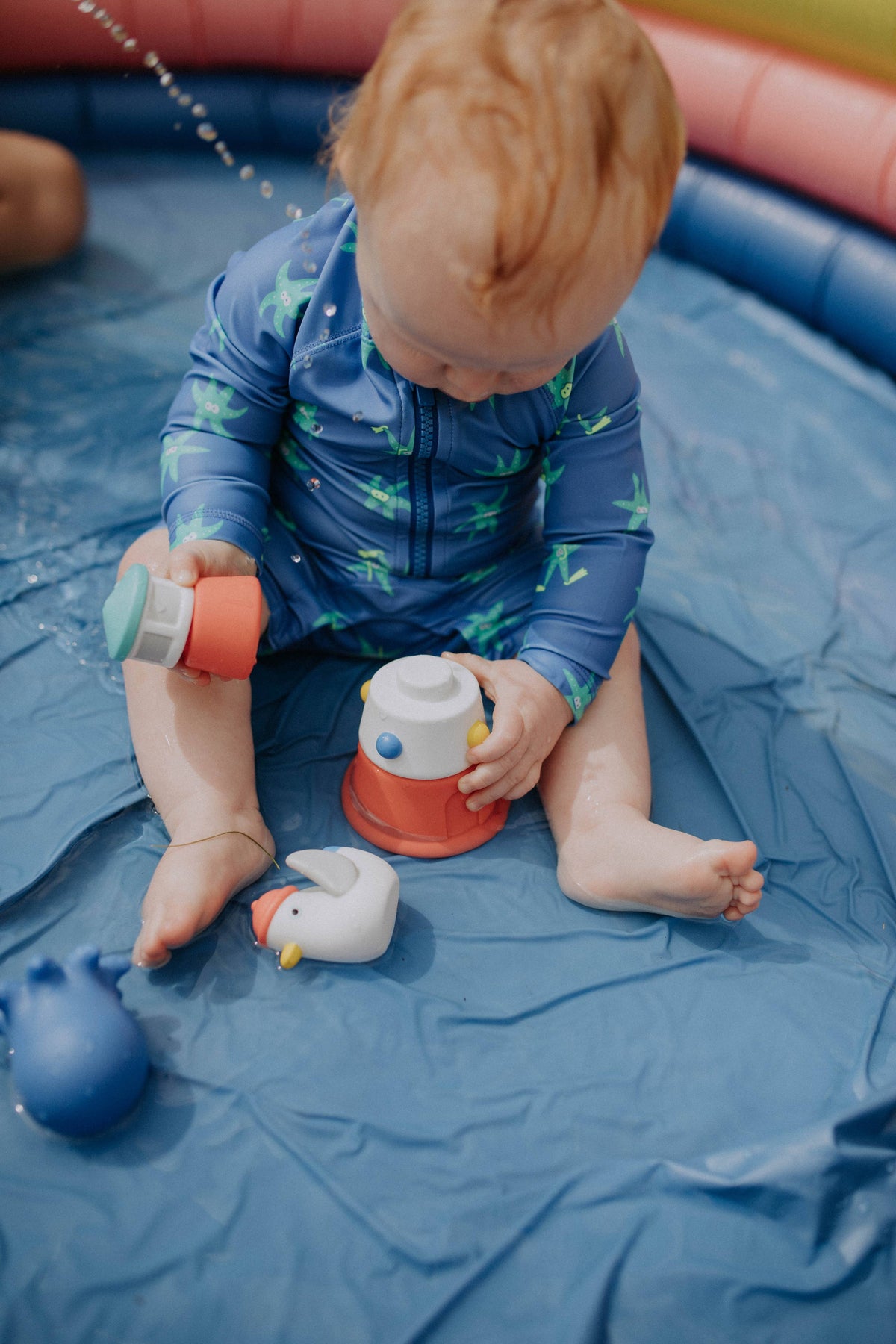 Itzy Stack & Squirt™ Bath + Water Toy - Mellow Monkey