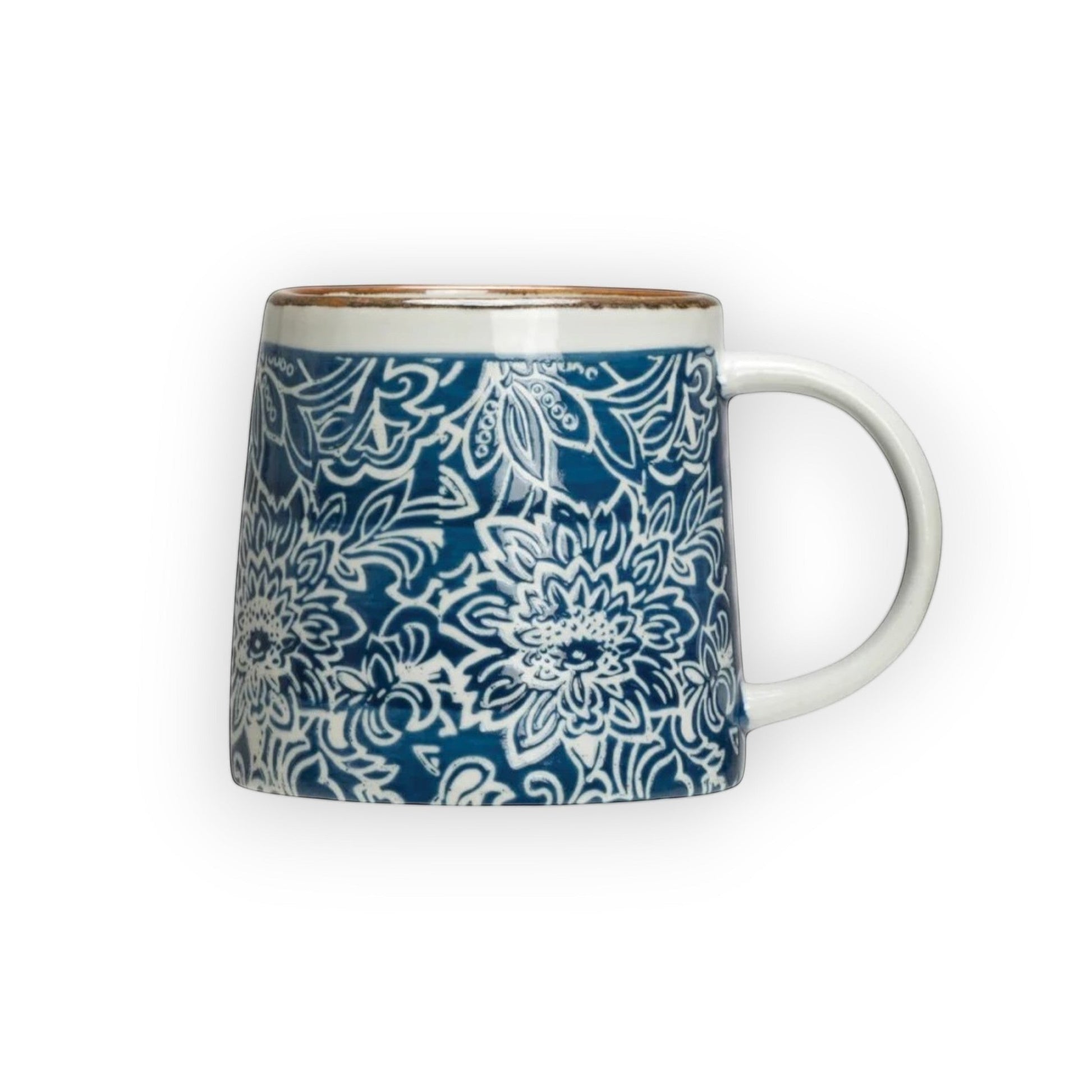 Mellow Monkey hand-stamped stoneware mug with blue floral design and gold rim detail. Microwave, dishwasher, and oven safe.
