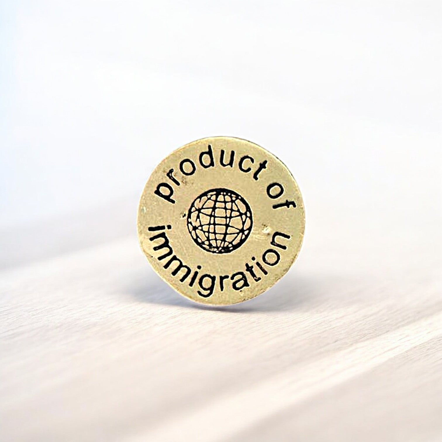 Product of Immigration - Recycled Brass Pin - Mellow Monkey