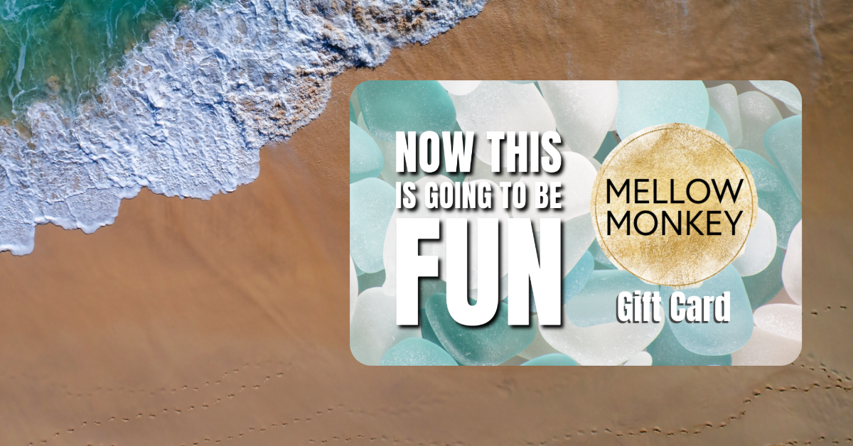 mellow monkey gift card reads Now This Is Going To Be Fun set against tropical beach with wave