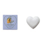 Heart-shaped white soap next to a box labeled 'Lemon Verbena' on a white background