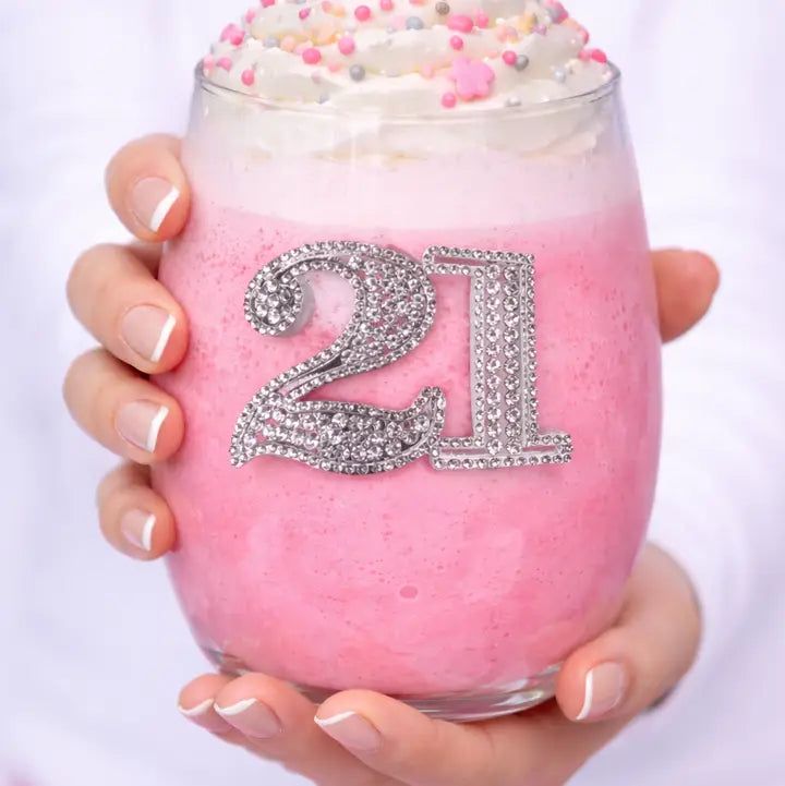 Mellow Monkey 21st birthday stemless wine glass decorated with sparkling silver rhinestones filled with pink drink