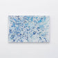Mellow Monkey large acrylic tray featuring Kim Hovell's Atlantic Reef artwork with blue and white oyster shell pattern.