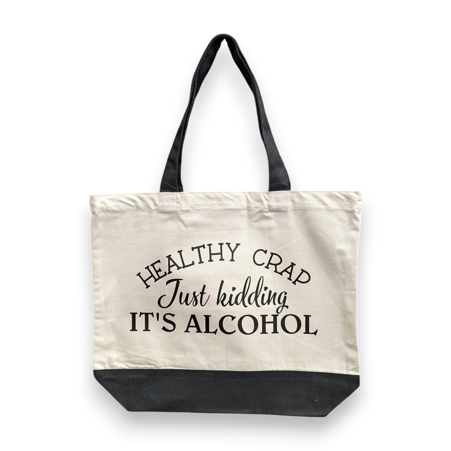 Mellow Monkey natural cotton tote bag with black handles and a black bottom, featuring the text "HEALTHY CRAP. Just kidding IT'S ALCOHOL."
