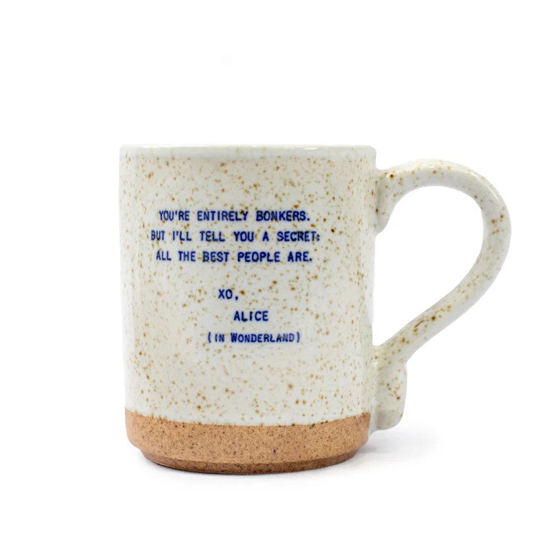 Mellow Monkey XO Alice in Wonderland ceramic mug with blue quote text and speckled cream finish