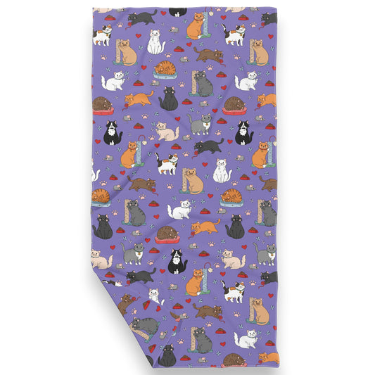 Mellow Monkey All The Cats double sided waffle dish towel with a purple background and a pattern of various cats, mice, hearts, and paw prints.