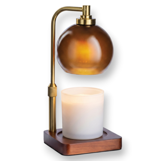 Mellow Monkey Amber Sphere Candle Warmer Lamp with a brushed gold stem, amber glass dome, and dark wood base.