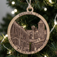 Mellow Monkey 4-inch round wooden ornament featuring laser-engraved Ansonia, CT landmarks hanging on a Christmas tree.