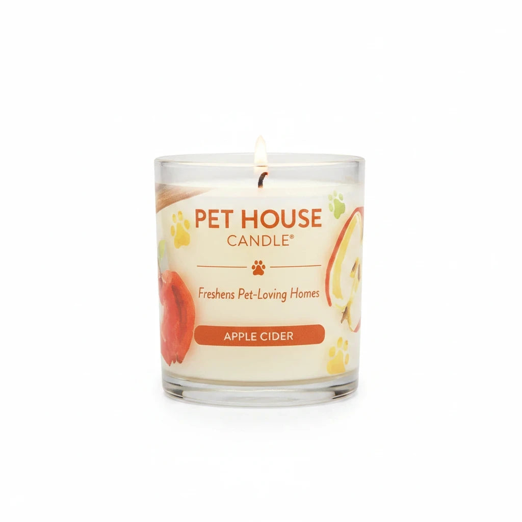 Mellow Monkey Pet House Apple Cider scented candle in a glass jar, formulated to neutralize pet odors.