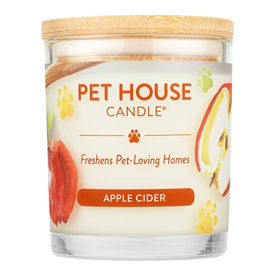 Mellow Monkey Pet House Candle in Apple Cider scent with a wooden lid and apple-themed label for pet owners