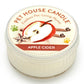 Mellow Monkey Pet House mini candle in Apple Cider scent, featuring a label with apple, cinnamon, and clove art.