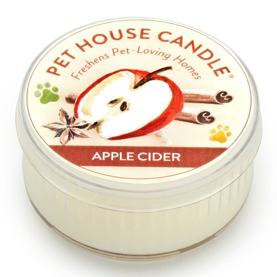 Mellow Monkey Pet House mini candle in Apple Cider scent, featuring a label with apple, cinnamon, and clove art.