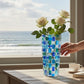 Mellow Monkey Aqua Bossanova Bud Vase - 6-in hand-painted Venetian glass in blue and green with woven pattern.