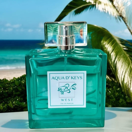 Mellow Monkey Aqua D' Keys West eau de parfum in a teal glass bottle with a tropical beach background.