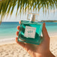 Mellow Monkey Aqua D' Keys West eau de parfum bottle held against a tropical beach background with palm leaves.