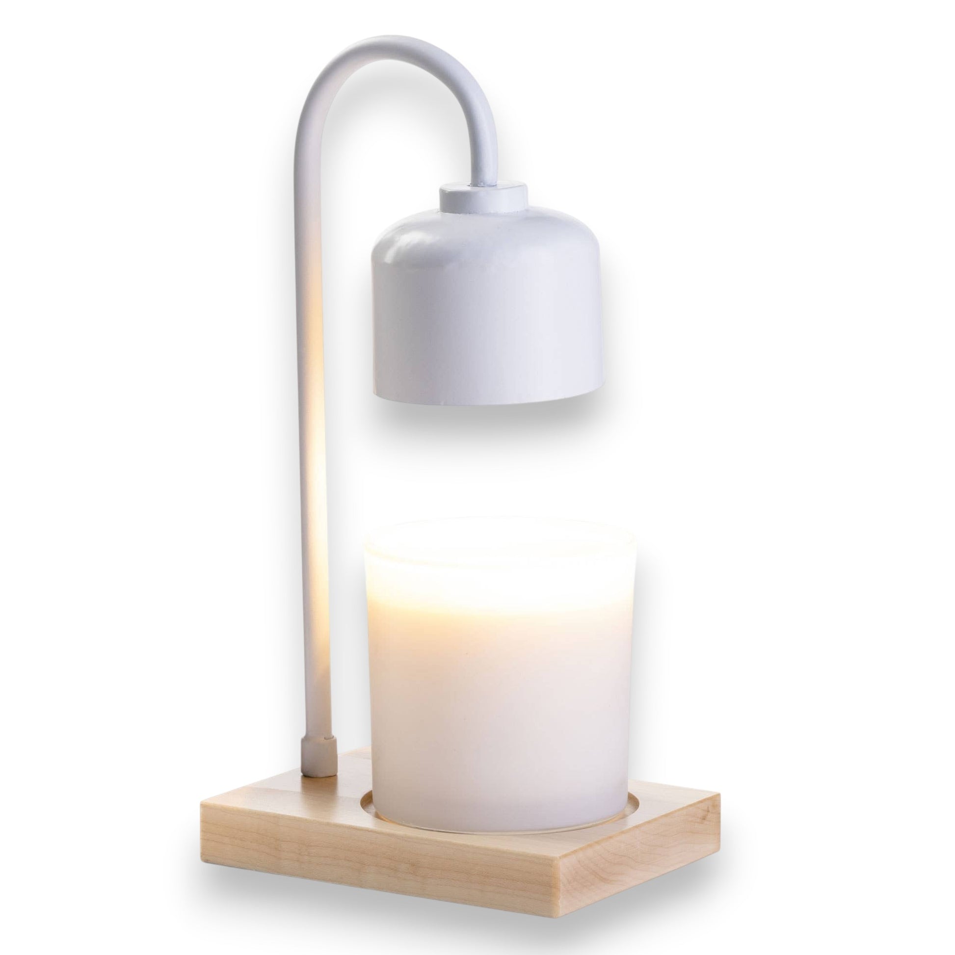 Mellow Monkey arched candle warmer lamp with a white metal shade and a natural wood base holding a glowing candle.