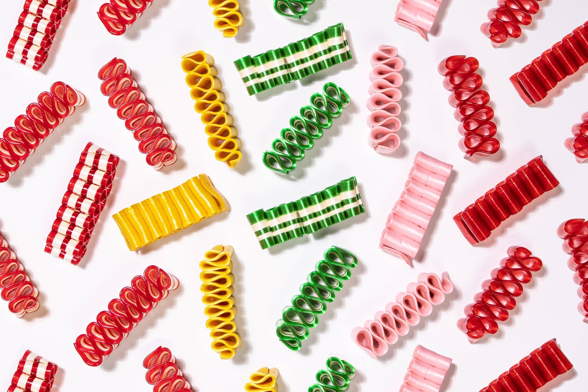 Mellow Monkey assorted colorful ribbon candies in peppermint, clove, cherry, cinnamon, and lemon flavors.