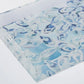 Mellow Monkey Atlantic Reef large acrylic serving tray with Kim Hovell art. Blue and white abstract coastal design.