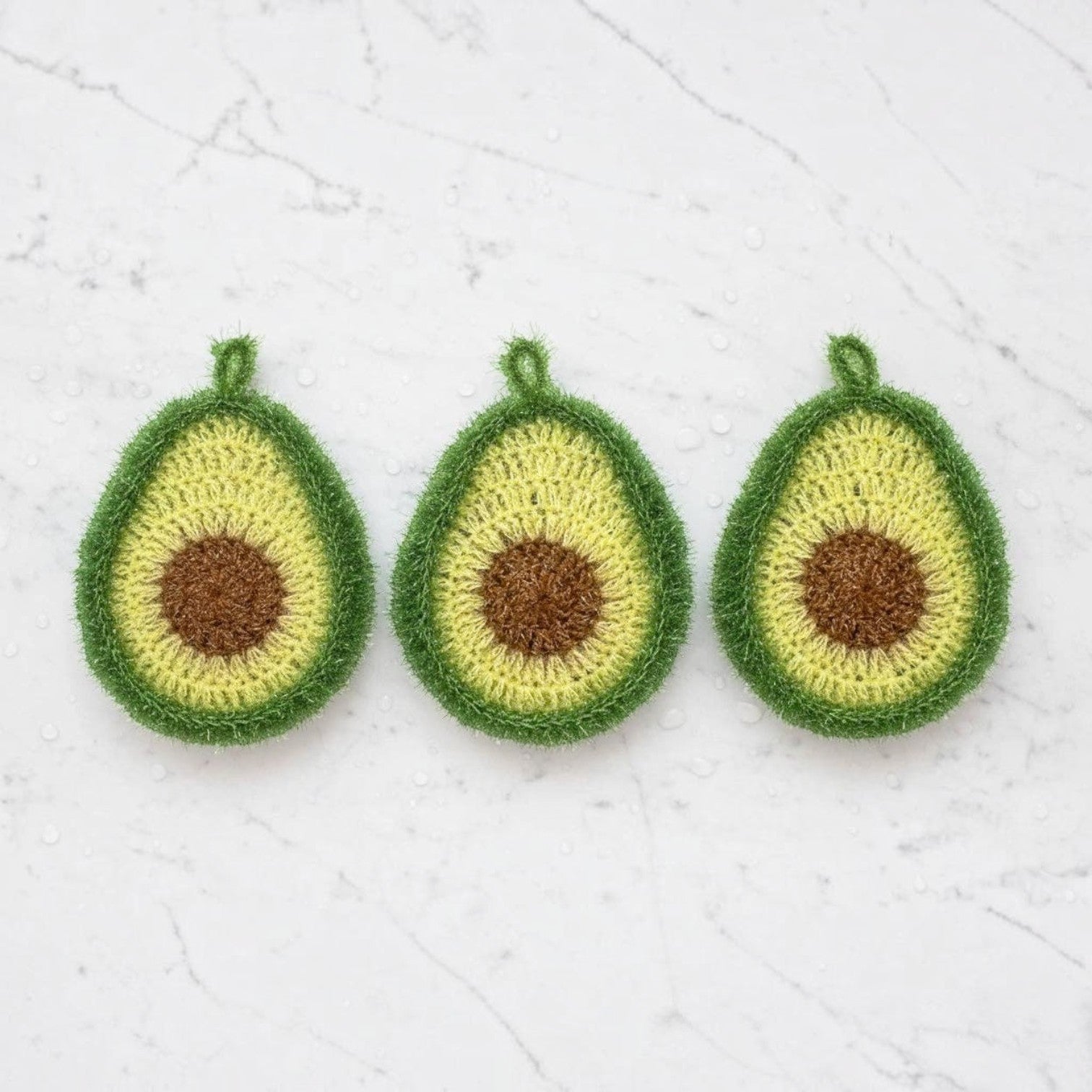 Mellow Monkey avocado-shaped kitchen scrubbers in green and brown, set of three handmade dish sponges.