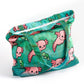 Mellow Monkey pink axolotl and green turtle print tote bag with zipper closure and dual straps, made of washable polyester canvas.