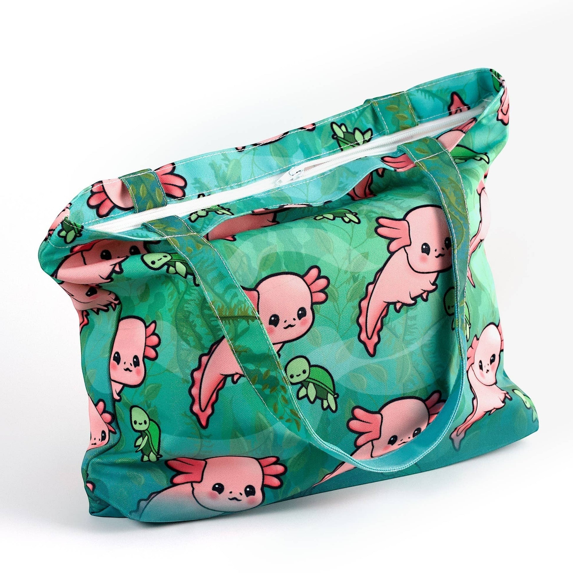 Mellow Monkey pink axolotl and green turtle print tote bag with zipper closure and dual straps, made of washable polyester canvas.
