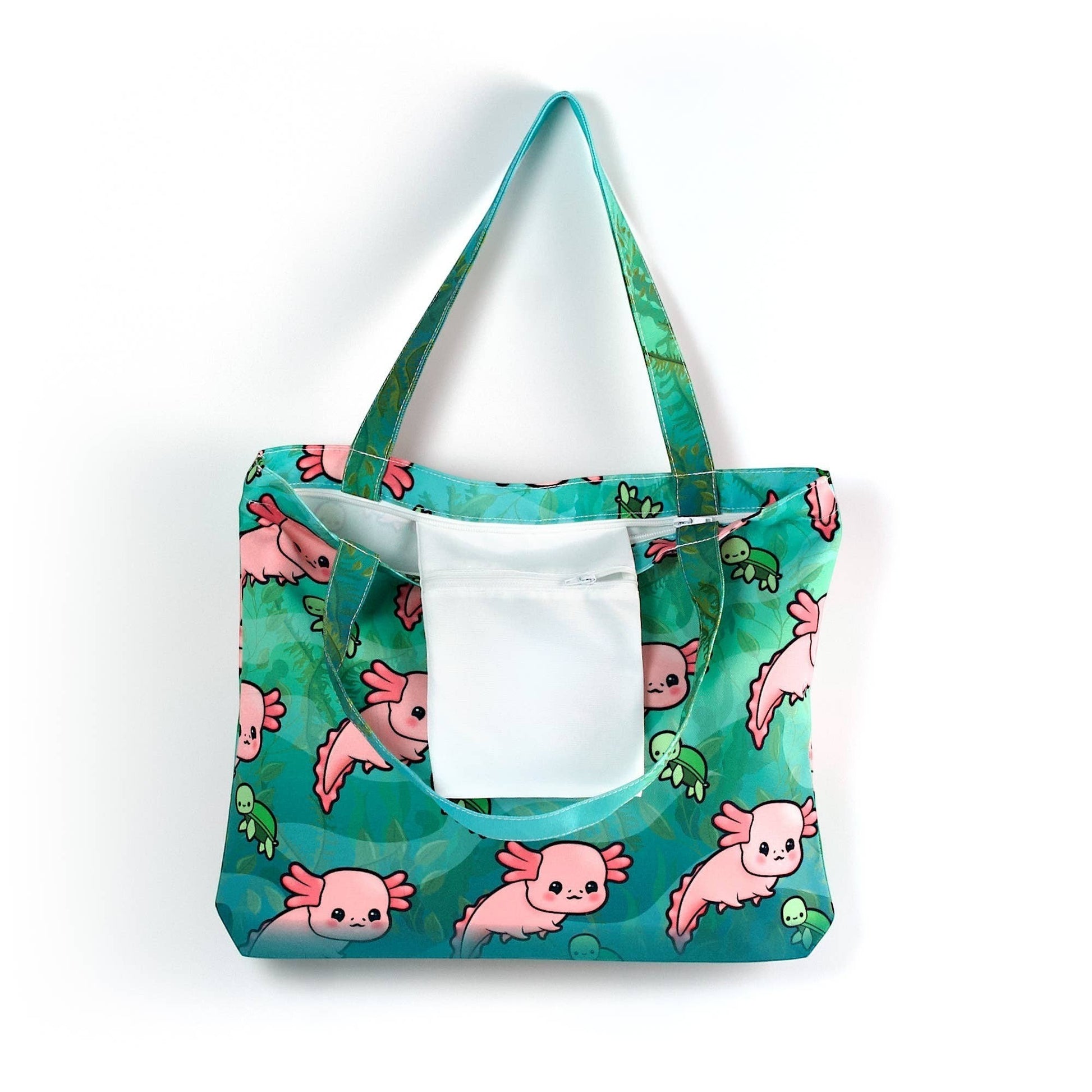 Mellow Monkey teal tote bag with a cute pink axolotl and green turtle print, featuring dual straps and an interior zippered pocket.