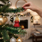Mellow Monkey Baby Angel Old World Christmas blown glass ornament, red glitter dress, white wings, gold halo. 3-in.