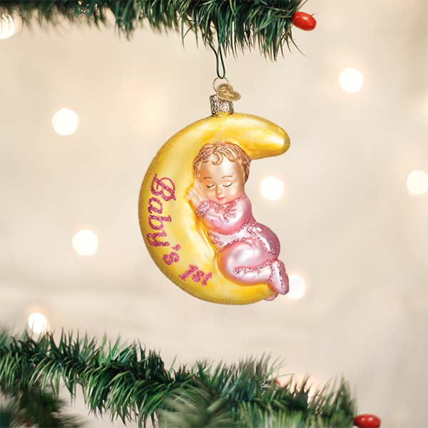 Mellow Monkey Dreamtime Girl blown glass ornament featuring a baby sleeping on a yellow crescent moon