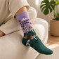 Mellow Monkey Not Me bamboo knit socks featuring a mushroom pattern, lavender sky, and forest green base.