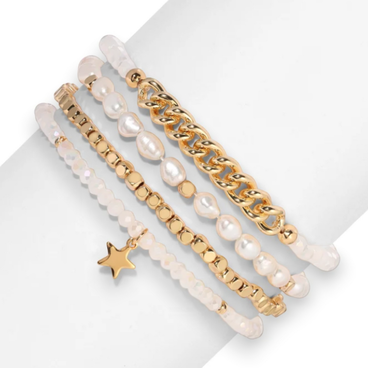 Mellow Monkey baroque pearl and ice white crystal bracelet set with 14K gold-plated star charm on a wrist