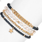 Mellow Monkey baroque pearl and indigo crystal stretch bracelet stack with 14K gold-plated star charm
