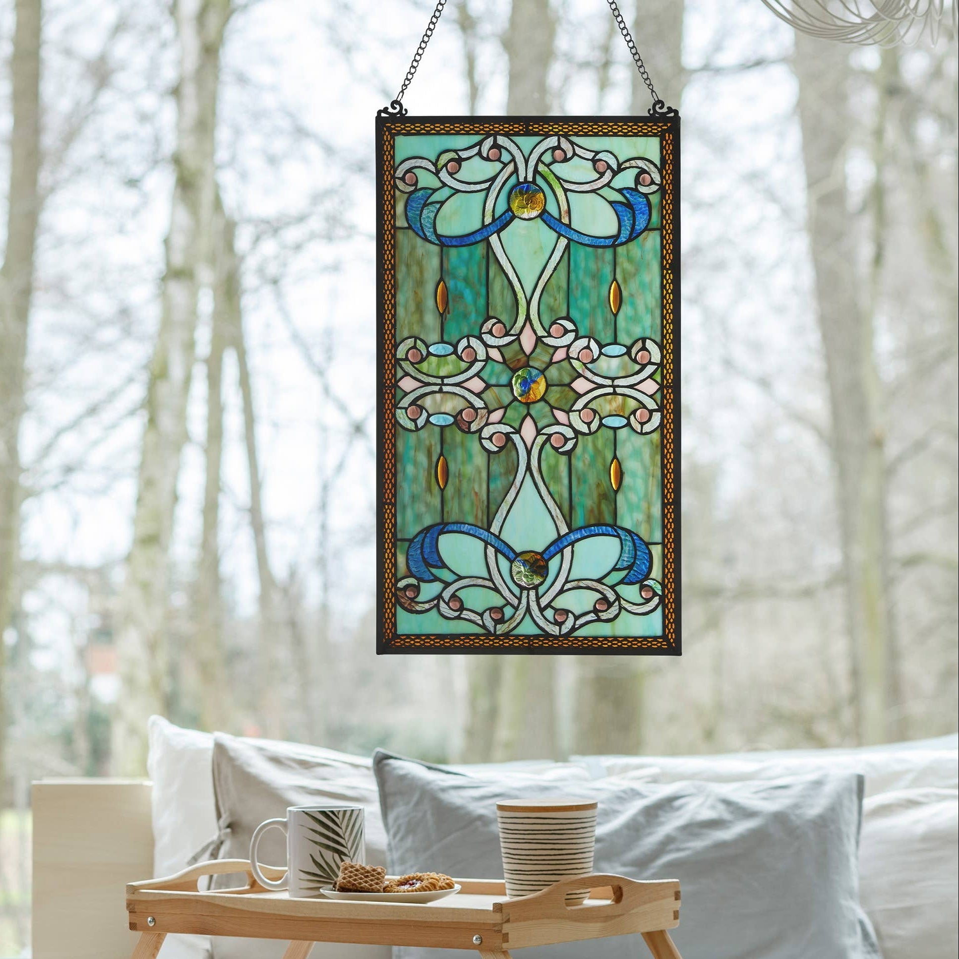 Mellow Monkey Baroque stained glass window panel with blue and green ribbons, cabochons, and metal frame hanging.