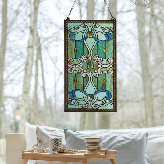 Mellow Monkey Baroque stained glass window panel with blue and green ribbons, cabochons, and metal frame hanging.