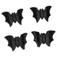 Mellow Monkey set of four black gothic bat-shaped mini claw clips for hair styling.