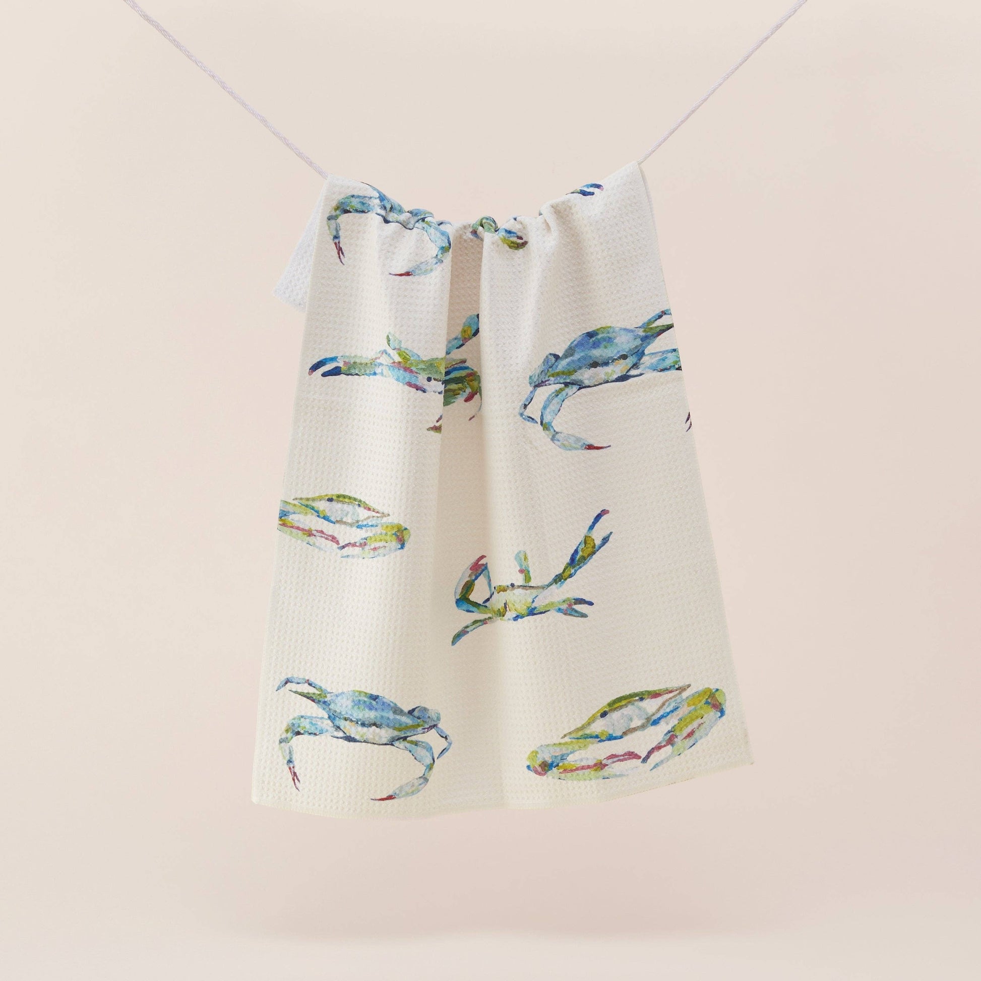 Mellow Monkey Bay Blues microfiber tea towel with Kim Hovell art featuring blue crabs. 16x24 inches.