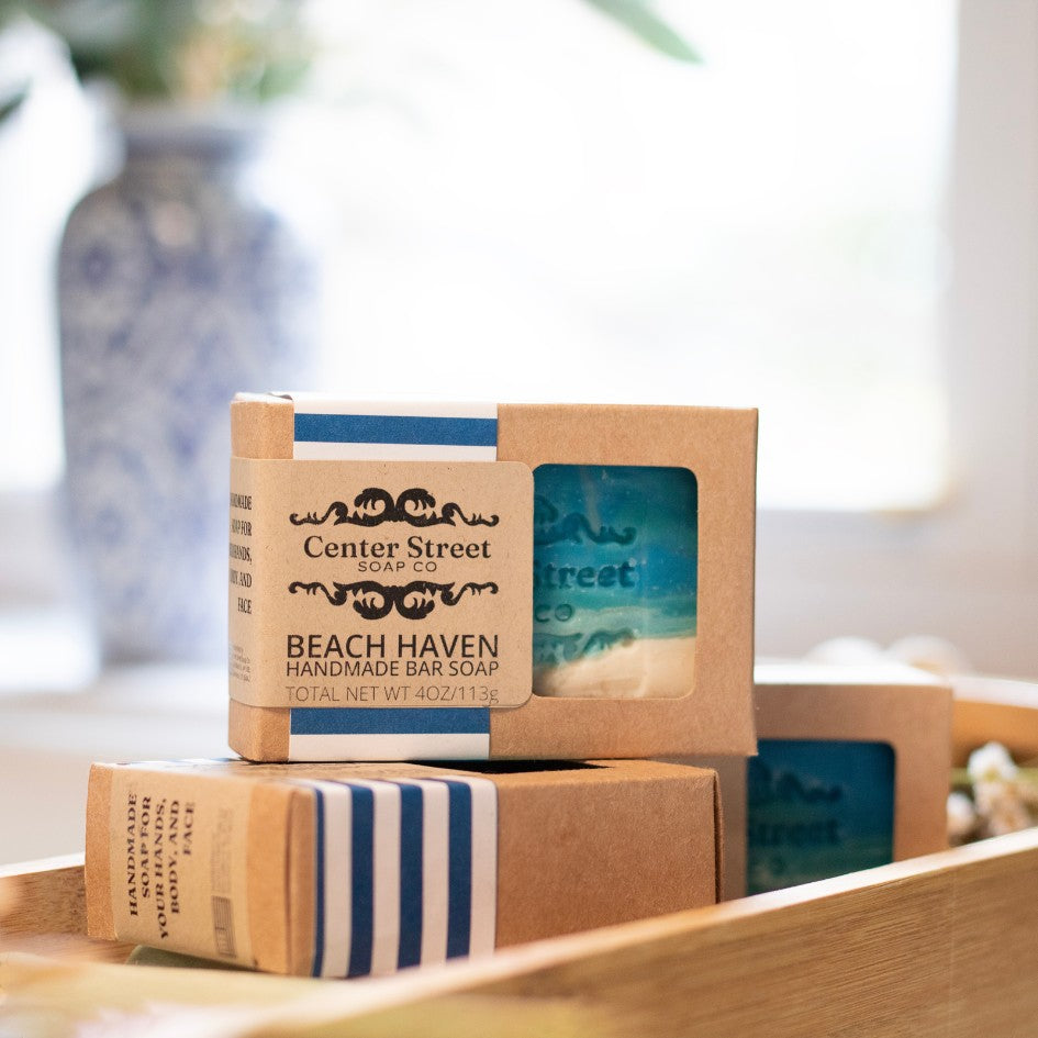 Mellow Monkey Beach Haven handmade bar soap, tropical fruit and coconut scent, blue and white striped packaging.