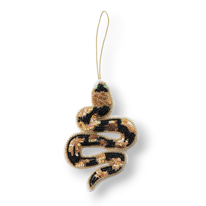 Mellow Monkey handmade snake ornament featuring black and gold sequins, beaded details, and a hanging loop.