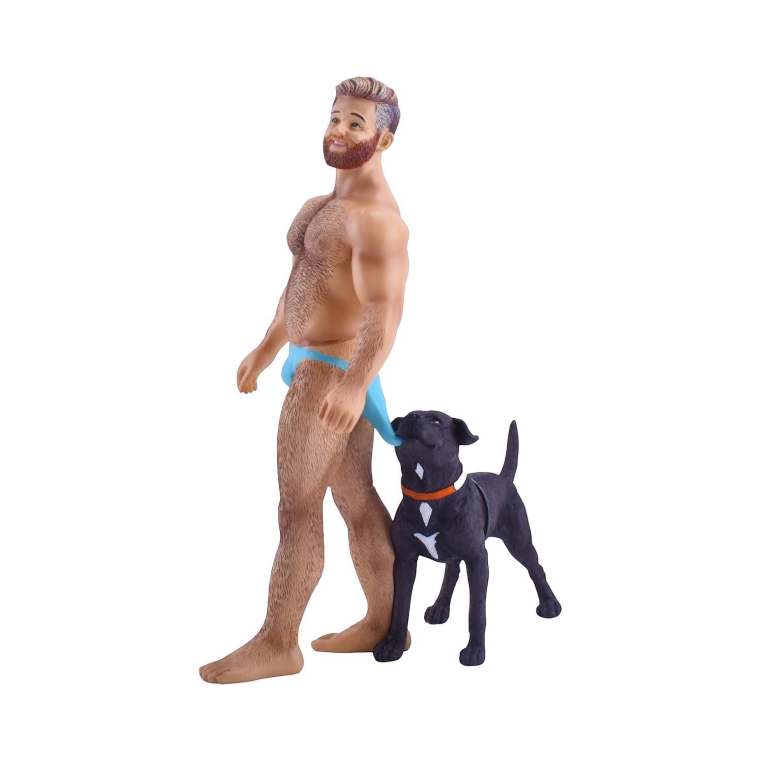 Mellow Monkey December Diamonds CopperTan Bear Figurine with blue speedo and black dog with orange collar.