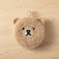 Mellow Monkey Good News Bears scrubby sponge in taupe, shaped like a bear face with black embroidered features and a hanging loop.