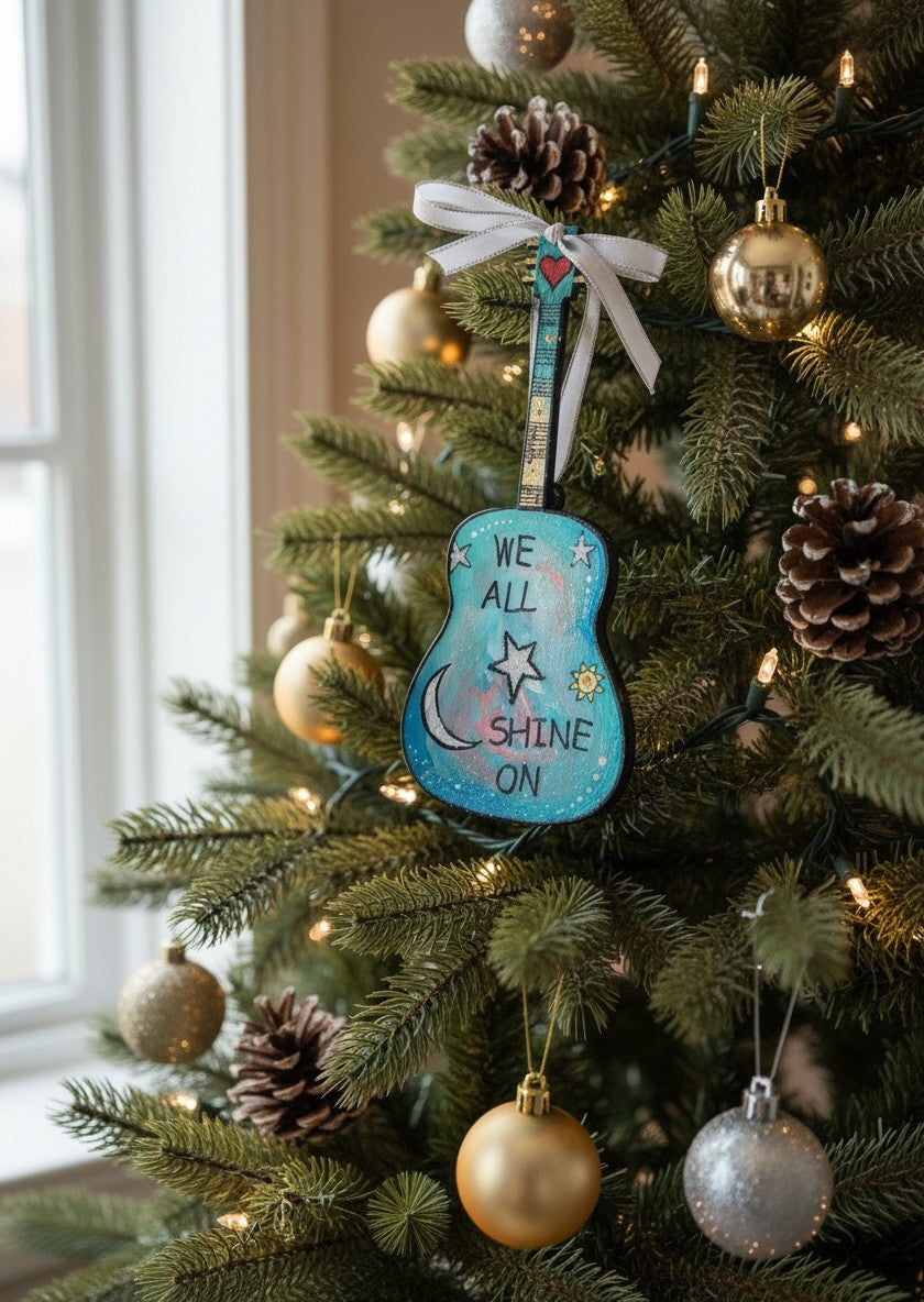 Mellow Monkey Beatles We All Shine On hand-painted wooden guitar Christmas ornament hanging on a decorated tree