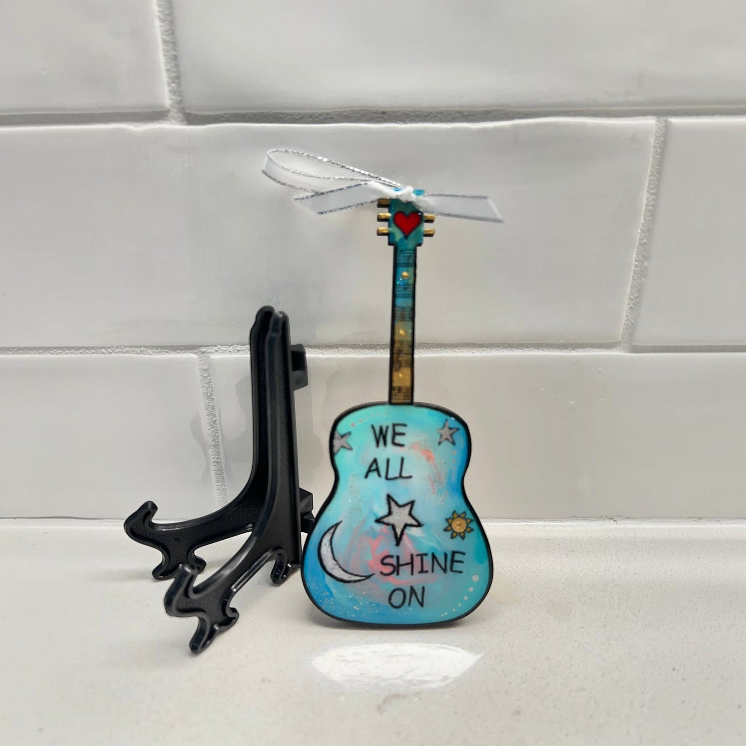 Mellow Monkey Beatles We All Shine On hand-painted wooden guitar ornament with resin finish and display easel.