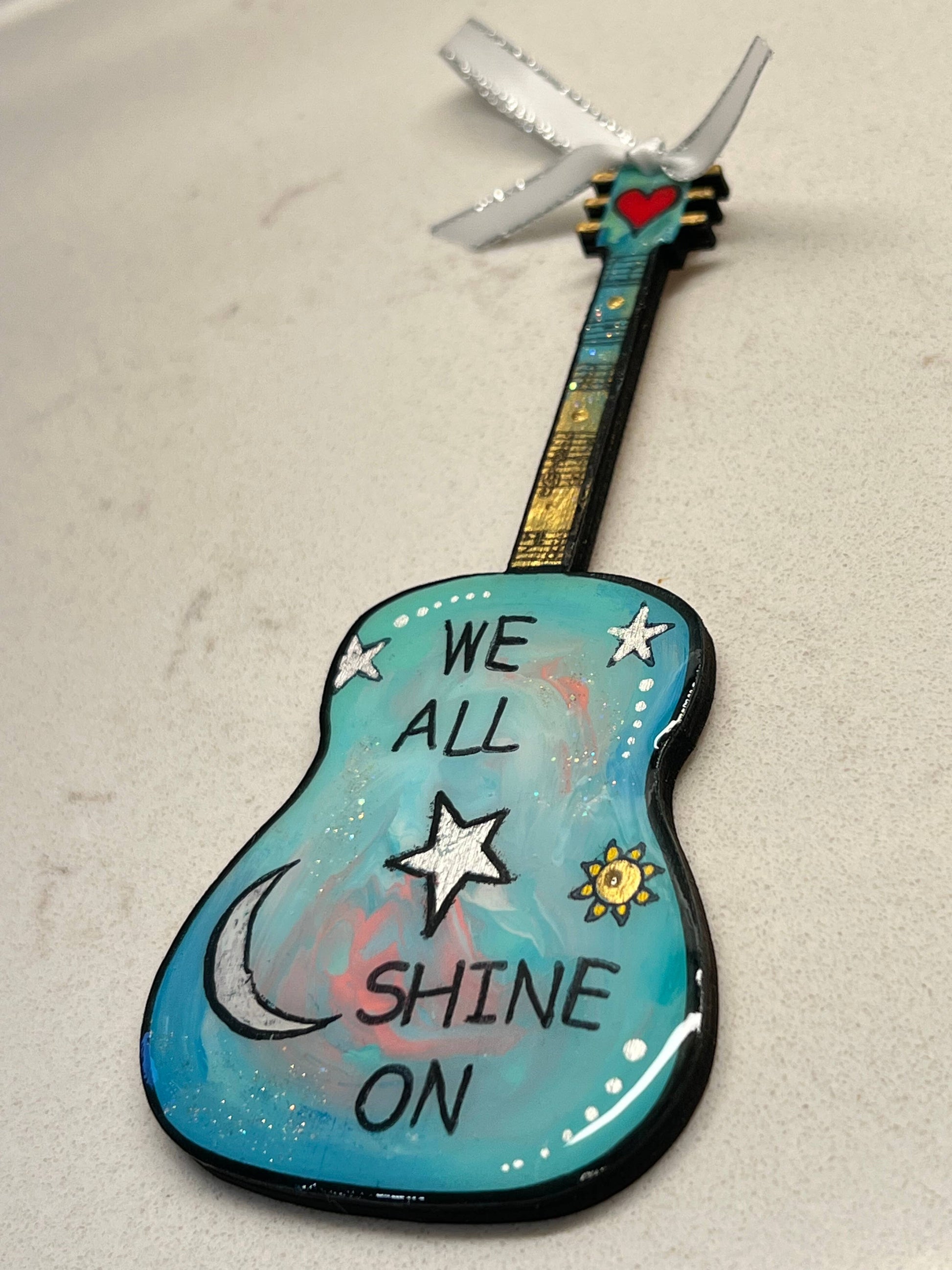 Mellow Monkey Beatles We All Shine On hand-painted wooden guitar ornament with glossy resin finish and ribbon loop.