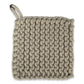 Mellow Monkey thick crocheted cotton pot holder in beige with a hanging loop. 8-inch square.
