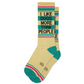 Mellow Monkey crew socks in beige with teal and pink stripes and the text I Like Dogs More Than People