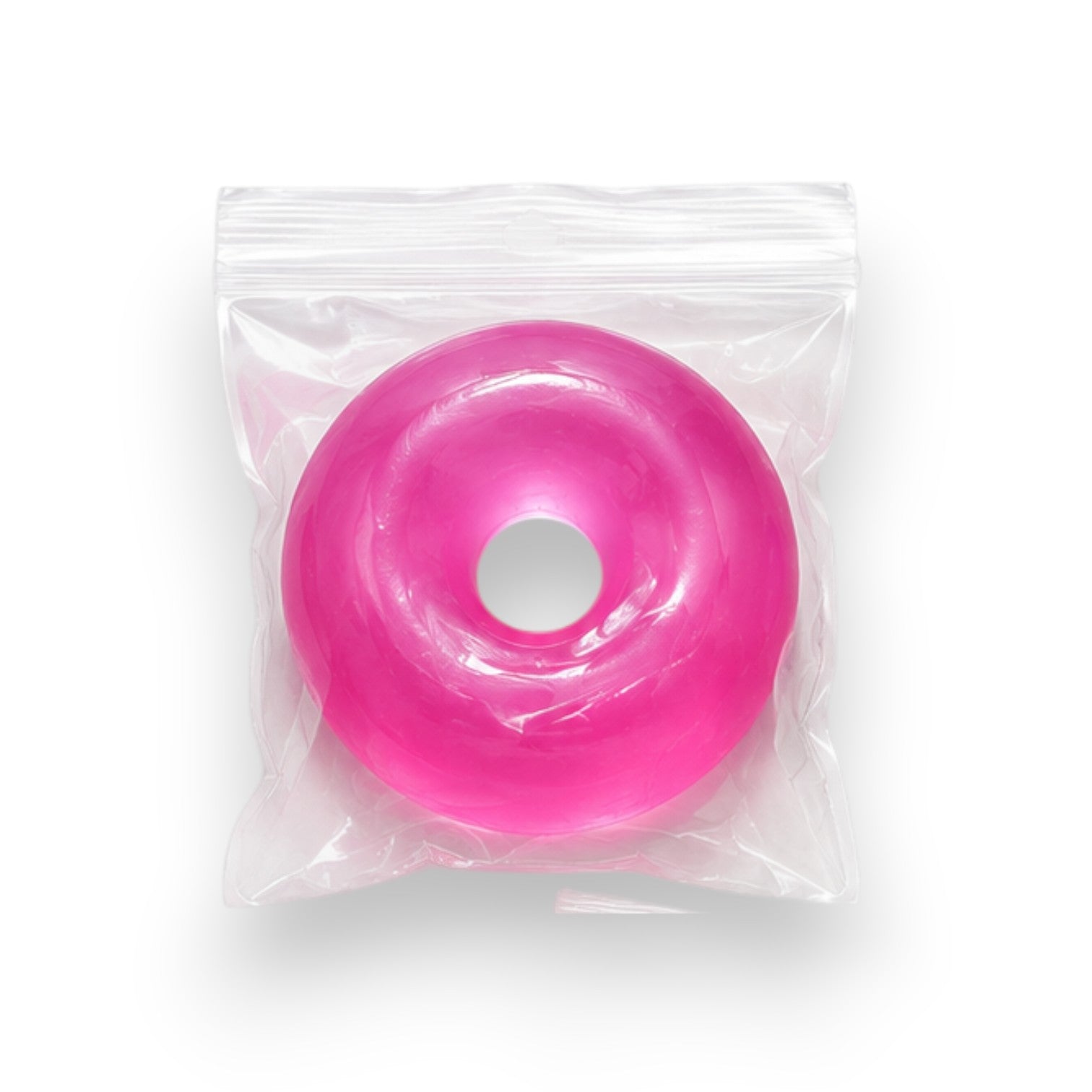 Mellow Monkey FEELZiES Jelly Donut Squishy in berry jam pink, a soft wearable sensory fidget toy in plastic packaging