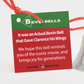 Mellow Monkey It's a Wonderful Life Bevin Bell ornament tag with red satin cord and silver bell detail